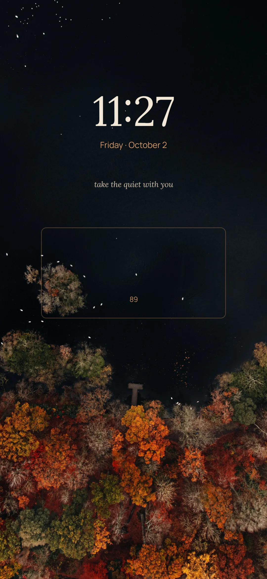 Night lake from above, with a clock, the date, the line take the quiet with you, and a gesture box showing the battery percent.